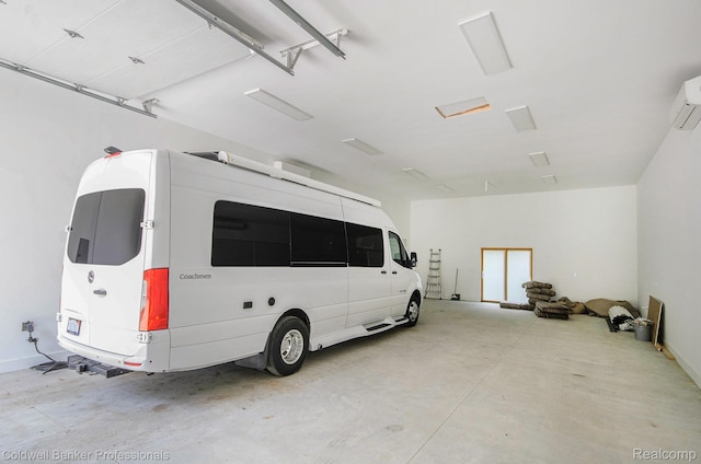 2740 Judah Rd, Lake Orion, MI 48359 - garage with a wall unit AC