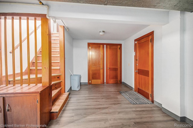 2740 Judah Rd, Lake Orion, MI 48359 - hallway featuring wood finished floors and stairs