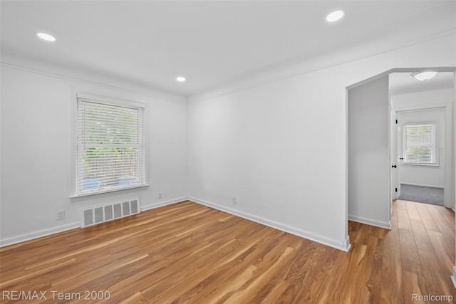 26389 Annapolis St, Dearborn Heights, MI 48125 - spare room featuring wood finished floors, plenty of natural light, recessed lighting, and ornamental molding