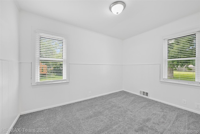 26389 Annapolis St, Dearborn Heights, MI 48125 - spare room with healthy amount of natural light, carpet flooring, and crown molding