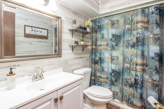 202 Redwine Dr, Houghton Lake, MI 48629 - bathroom with wooden walls, vanity, and a shower with shower curtain