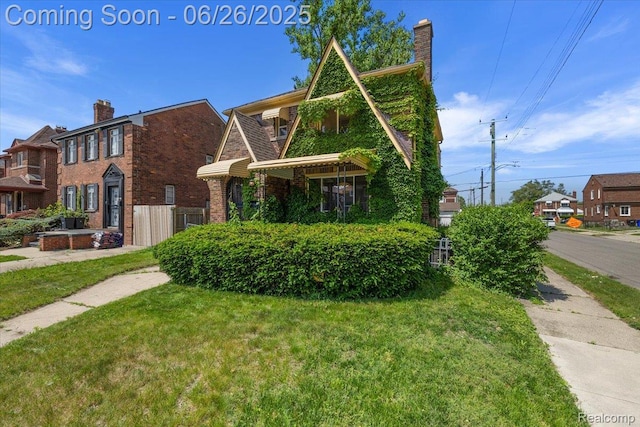 17617 Indiana St, Detroit, MI 48221 - view of front of property featuring a front yard and brick siding