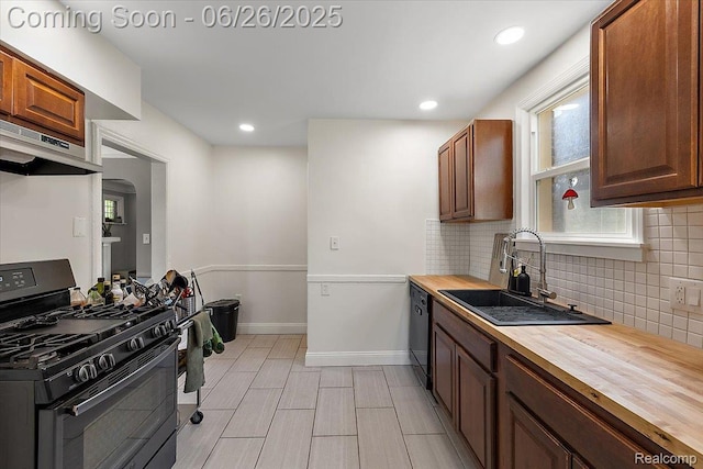 17617 Indiana St, Detroit, MI 48221 - kitchen featuring black appliances, butcher block countertops, exhaust hood, tasteful backsplash, and recessed lighting