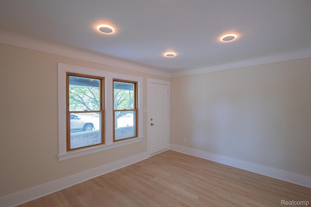 24917 Dale Ave, Eastpointe, MI 48021 - unfurnished room with light wood-style floors and baseboards