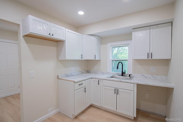 24917 Dale Ave, Eastpointe, MI 48021 - kitchen with light wood-style floors, white cabinets, and recessed lighting