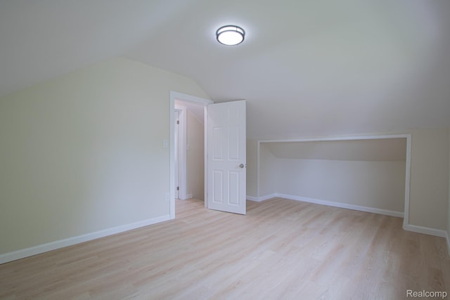 24917 Dale Ave, Eastpointe, MI 48021 - additional living space featuring light wood-style flooring and vaulted ceiling