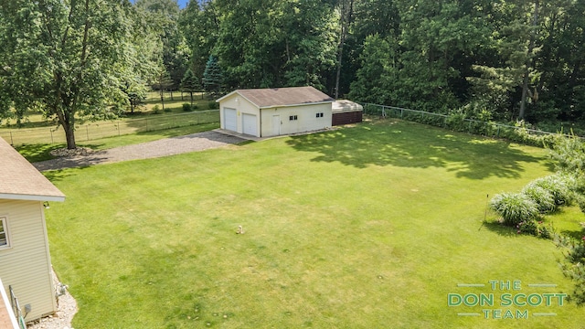 11829 Hoskins Ave NE, Cedar Springs, MI 49319 - view of yard featuring an outdoor structure and a garage