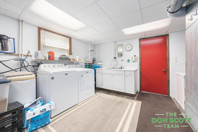 11829 Hoskins Ave NE, Cedar Springs, MI 49319 - laundry area with washing machine and clothes dryer and cabinet space