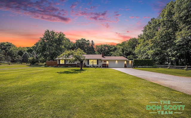 11829 Hoskins Ave NE, Cedar Springs, MI 49319 - single story home featuring a garage, a chimney, concrete driveway, and view of wooded area