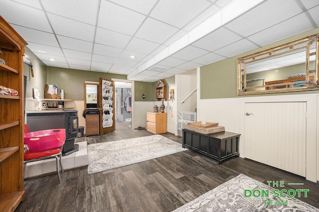 11829 Hoskins Ave NE, Cedar Springs, MI 49319 - home office featuring a wainscoted wall, wood finished floors, and a paneled ceiling