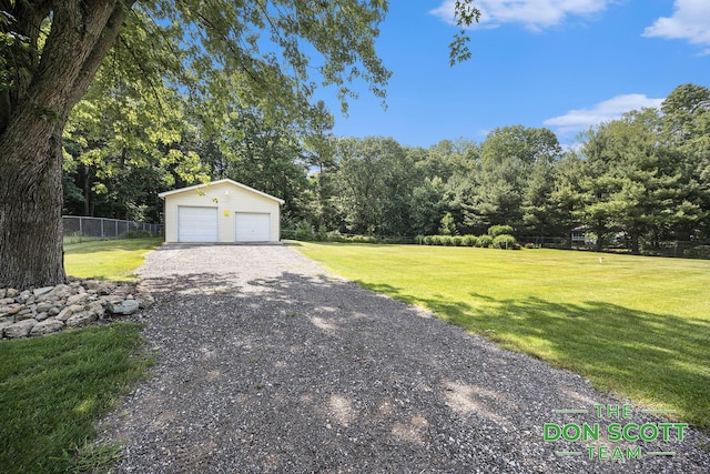 11829 Hoskins Ave NE, Cedar Springs, MI 49319 - view of yard featuring an outdoor structure and a detached garage