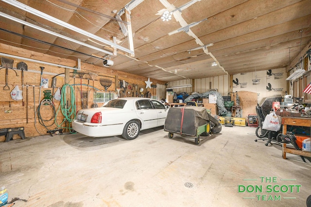 11829 Hoskins Ave NE, Cedar Springs, MI 49319 - garage featuring a garage door opener