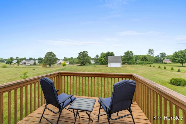 4233 Ives Farm Ln NE, Cedar Springs, MI 49319 - wooden terrace featuring an outdoor structure and a lawn