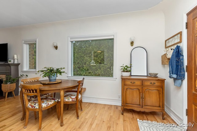 3976 Port Sheldon St, Hudsonville, MI 49426 - dining space featuring light wood-style floors and baseboards
