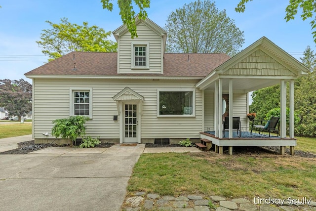 3976 Port Sheldon St, Hudsonville, MI 49426 - view of front of house featuring a front yard and roof with shingles