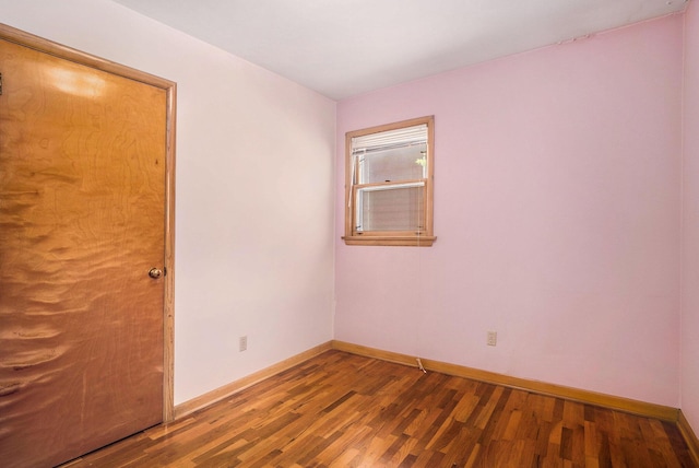 1975 Southwood Ave, Norton Shores, MI 49441 - empty room with baseboards and wood finished floors