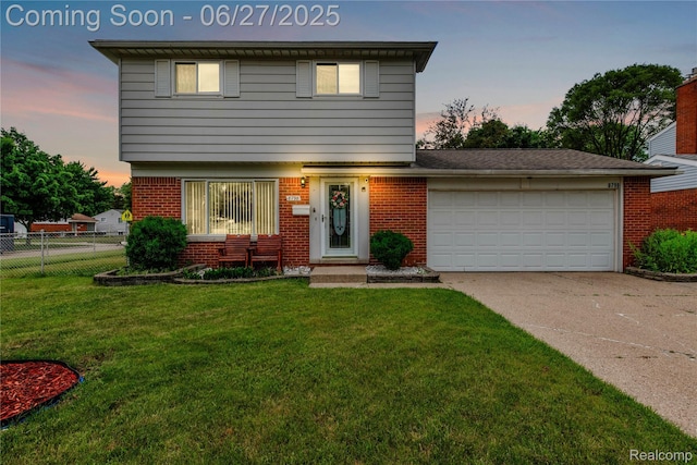 8798 Lozen Dr, Sterling Heights, MI 48313 - colonial inspired home with brick siding, driveway, and a garage