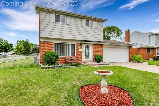 8798 Lozen Dr, Sterling Heights, MI 48313 - colonial-style house with a garage, brick siding, and driveway