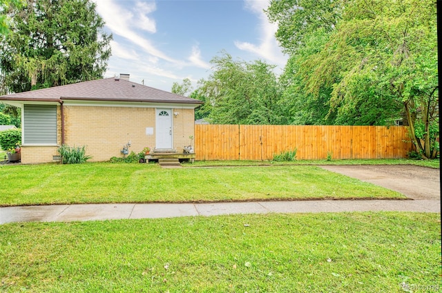 1478 Desoto Ave, Ypsilanti, MI 48198 - view of front of home featuring brick siding, entry steps, and a shingled roof