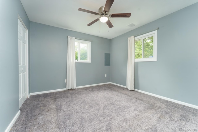 1478 Desoto Ave, Ypsilanti, MI 48198 - empty room with a ceiling fan, electric panel, and carpet flooring
