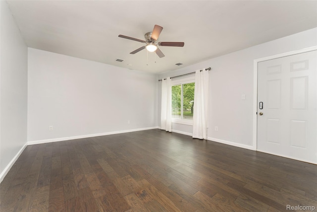 1478 Desoto Ave, Ypsilanti, MI 48198 - empty room with ceiling fan and dark wood-style flooring