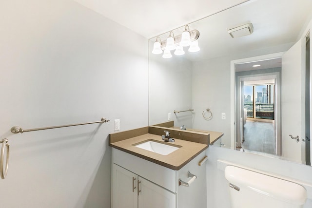 3320 Spinnaker Ln Unit 16D, Detroit, MI 48207 - half bathroom with toilet and vanity