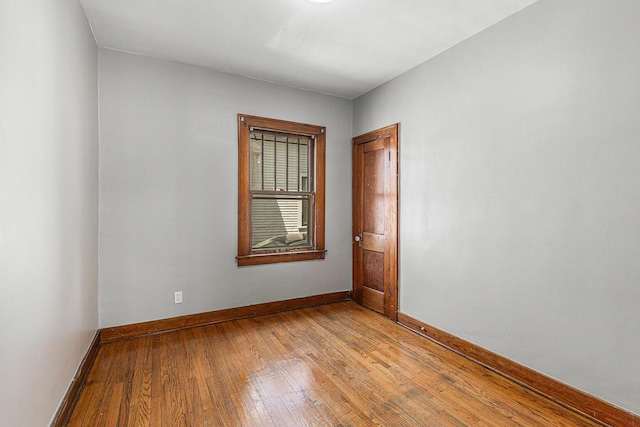 941 Mcreynolds Ave NW, Grand Rapids, MI 49504 - spare room featuring light wood-style flooring and baseboards