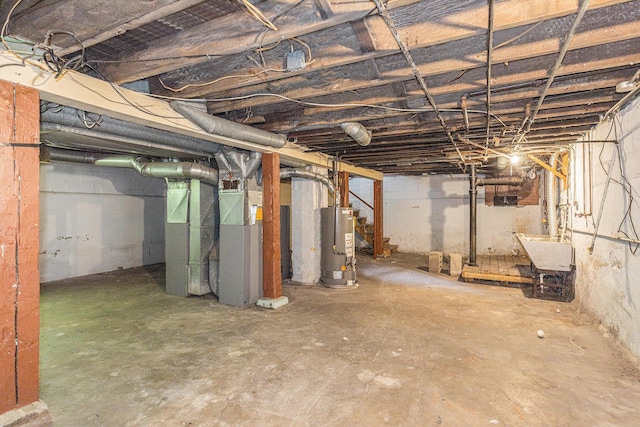 941 Mcreynolds Ave NW, Grand Rapids, MI 49504 - unfinished basement with water heater, heating unit, and stairs