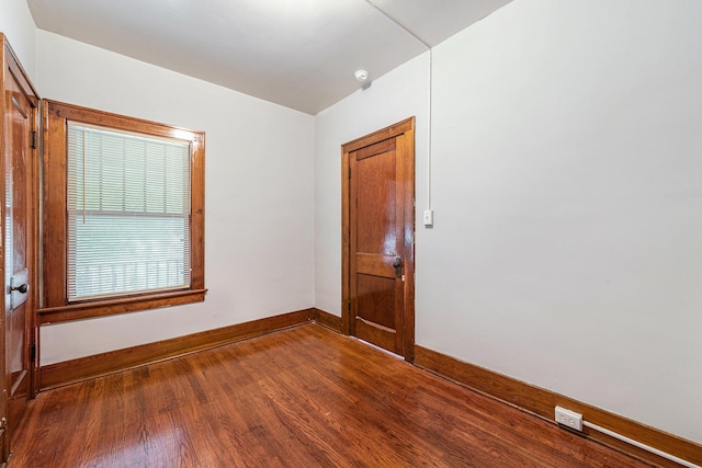 941 Mcreynolds Ave NW, Grand Rapids, MI 49504 - empty room featuring wood finished floors and a smoke detector