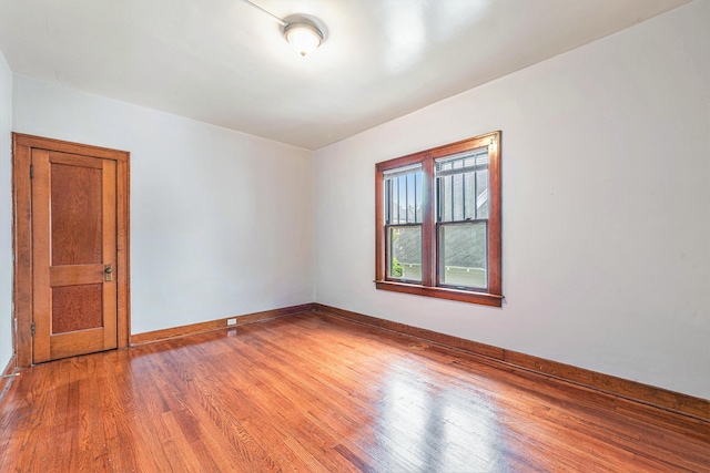 941 Mcreynolds Ave NW, Grand Rapids, MI 49504 - empty room with wood finished floors