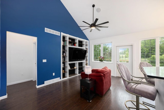 1156 N Bridge St, Linden, MI 48451 - living room featuring high vaulted ceiling, ceiling fan, healthy amount of natural light, wood finished floors, and built in shelves