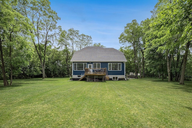 1156 N Bridge St, Linden, MI 48451 - rear view of house featuring a deck and a lawn