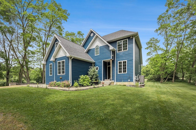 1156 N Bridge St, Linden, MI 48451 - view of front of home featuring a front lawn and a shingled roof