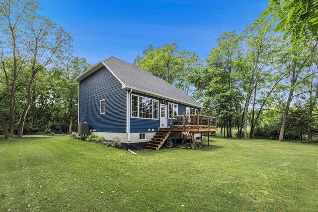 1156 N Bridge St, Linden, MI 48451 - back of house featuring stairs, a wooden deck, a lawn, and a shingled roof