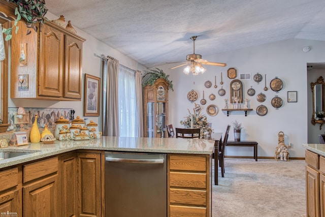 845 Riverlane Dr, Owosso, MI 48867 - kitchen with stainless steel dishwasher, ceiling fan, a peninsula, light carpet, and light stone countertops