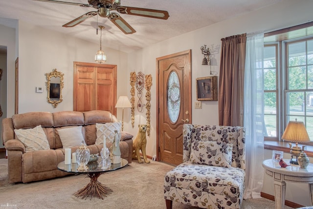 845 Riverlane Dr, Owosso, MI 48867 - living area with carpet floors and a ceiling fan