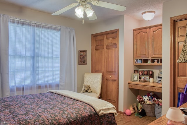 845 Riverlane Dr, Owosso, MI 48867 - bedroom with wood finished floors and a ceiling fan