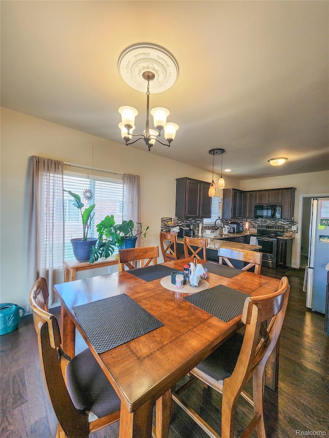 30475 Berghway Trl, Warren, MI 48092 - dining room featuring a chandelier and dark wood-type flooring