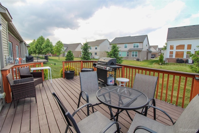 30475 Berghway Trl, Warren, MI 48092 - deck with outdoor dining area, a grill, a residential view, and a lawn