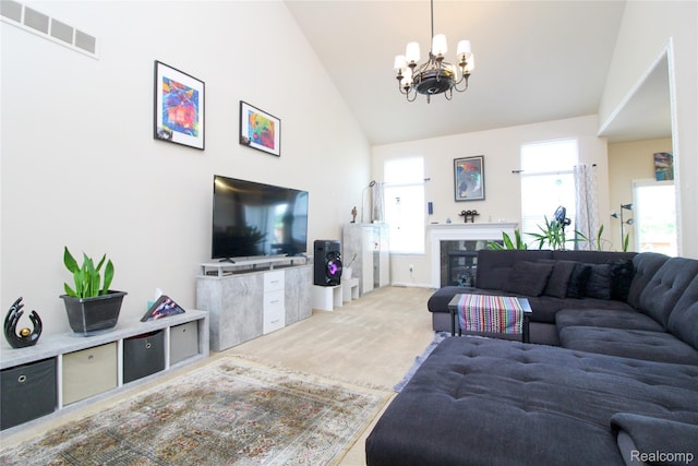 30475 Berghway Trl, Warren, MI 48092 - carpeted living area featuring a chandelier, high vaulted ceiling, and a glass covered fireplace