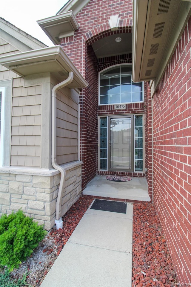 30475 Berghway Trl, Warren, MI 48092 - property entrance with stone siding