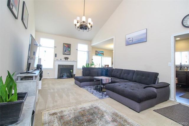 30475 Berghway Trl, Warren, MI 48092 - living room with carpet floors, a fireplace, a chandelier, and high vaulted ceiling
