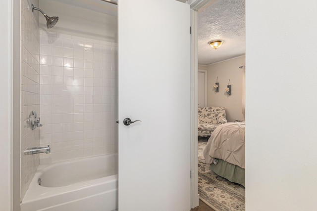 209 Maple St, Three Oaks, MI 49128 - full bathroom featuring a textured ceiling, bathing tub / shower combination, and ensuite bath