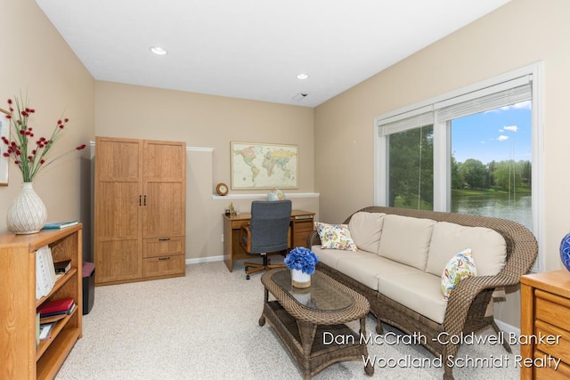 1809 Woodside Trl NW, Grand Rapids, MI 49504 - living room featuring light carpet, recessed lighting, and a desk