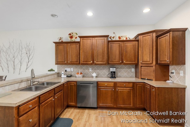1809 Woodside Trl NW, Grand Rapids, MI 49504 - kitchen featuring dishwasher, brown cabinets, decorative backsplash, light countertops, and recessed lighting