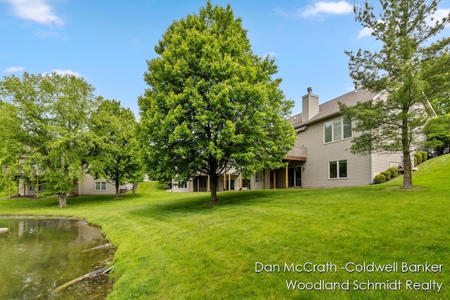 1809 Woodside Trl NW, Grand Rapids, MI 49504 - view of grassy yard featuring a deck