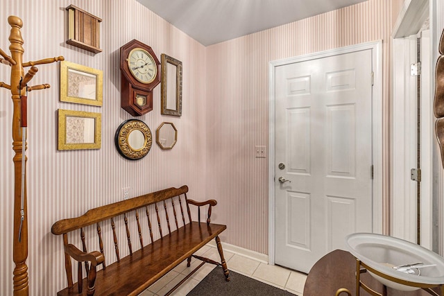 49202 Cheshire Ln, Canton, MI 48187 - entryway with wallpapered walls and light tile patterned flooring