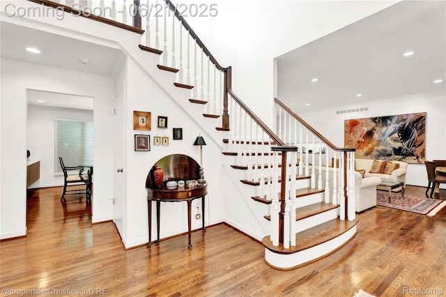 4768 Wendrick Dr, West Bloomfield, MI 48323 - staircase featuring wood finished floors and recessed lighting