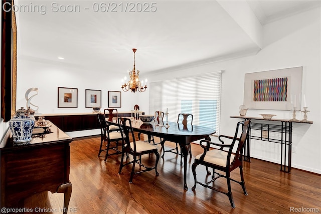 4768 Wendrick Dr, West Bloomfield, MI 48323 - dining room featuring dark wood-style flooring, crown molding, and a chandelier