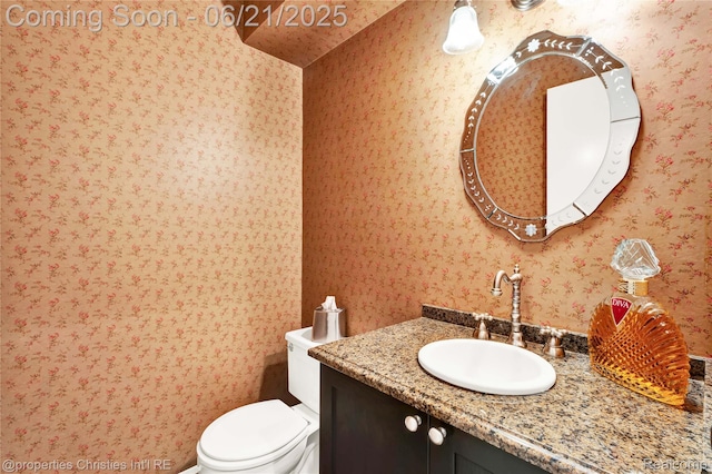 4768 Wendrick Dr, West Bloomfield, MI 48323 - bathroom featuring vanity and wallpapered walls